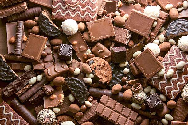 A mix of various chocolate candy and bars.