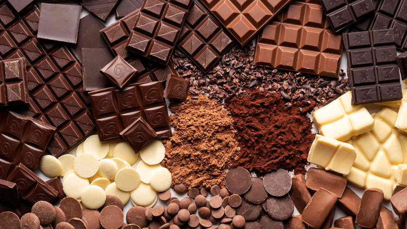 A pile of various chocolate pieces gathered to celebrate World Chocolate Day on July 7th.